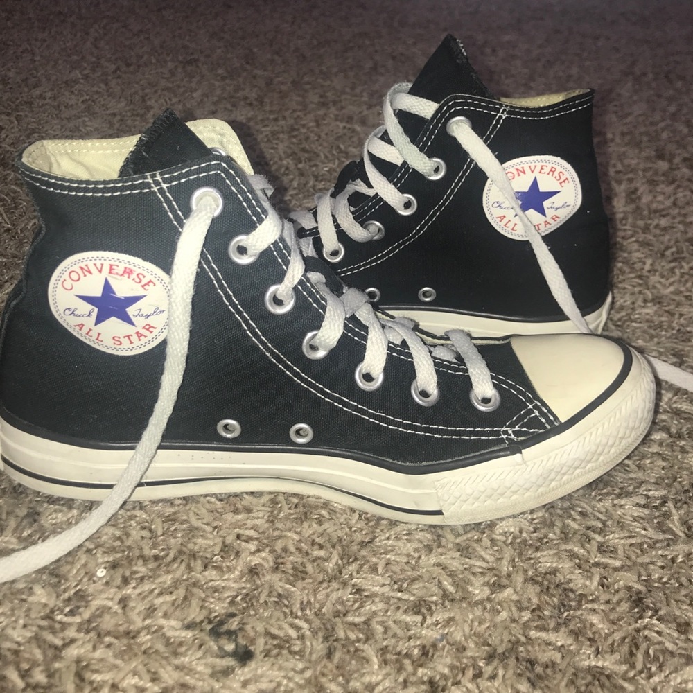 Black and white high top converse